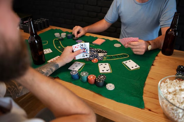 Blackjack table with dealer and cards