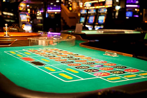 Live dealer rolling three dice